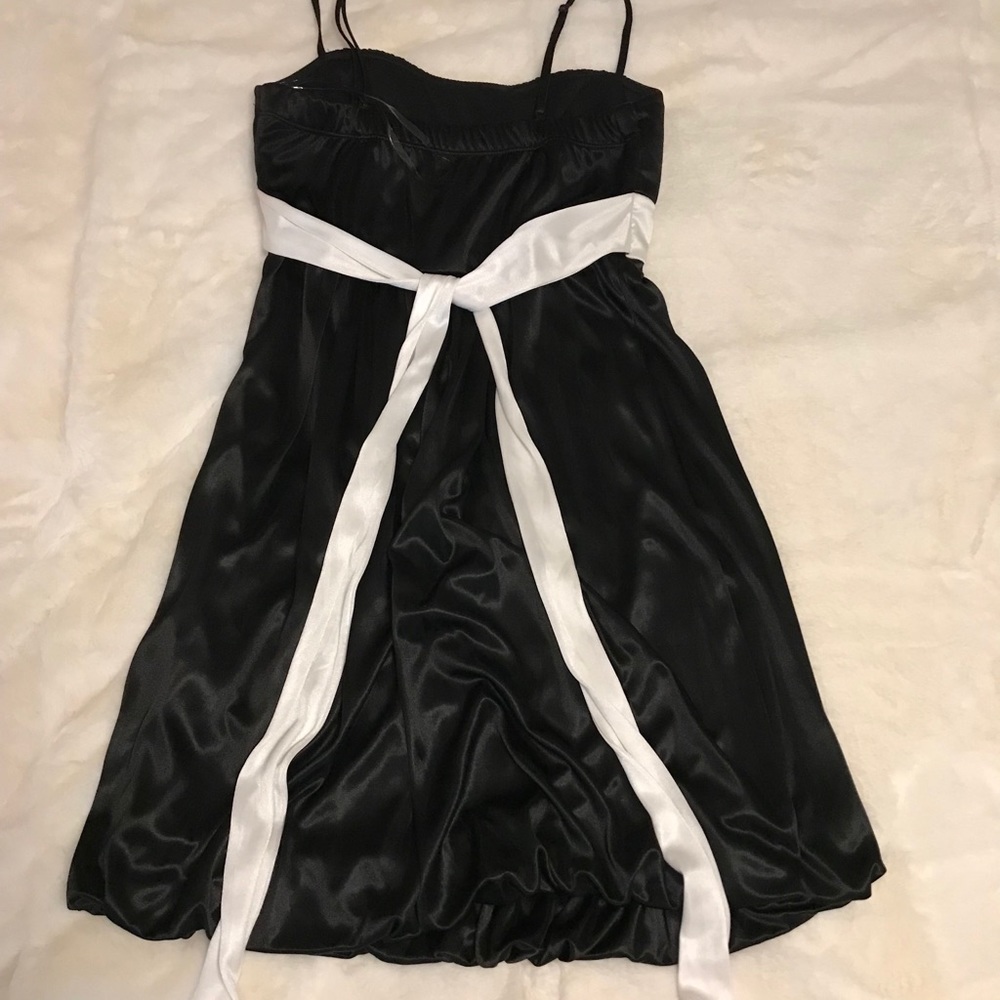 Black mini dress with white bow & rhinestone gem